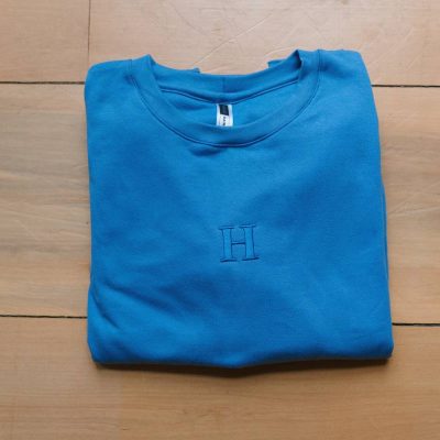 Personalised embroidered Kiddies Initial Crew Neck Sweaters from Dale Raine, handmade in Cape Town for sustainable comfort.