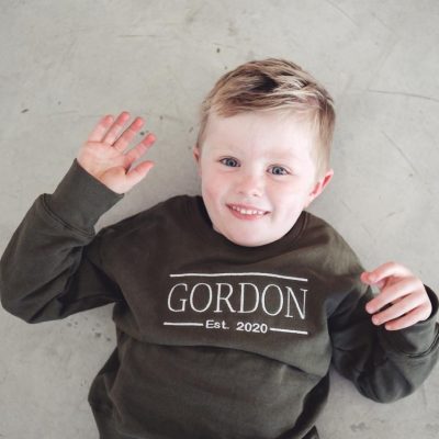 Embroidered kids and baby clothing by Dale Raine, crafted in Cape Town for soft, sustainable kids wear.