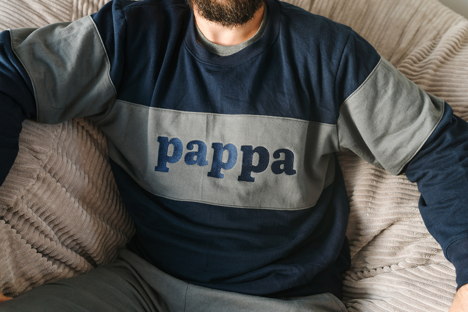 Man wearing Dale Raine’s comfortable embroidered two-tone crew neck sweater, locally handmade in Cape Town for everyday style.